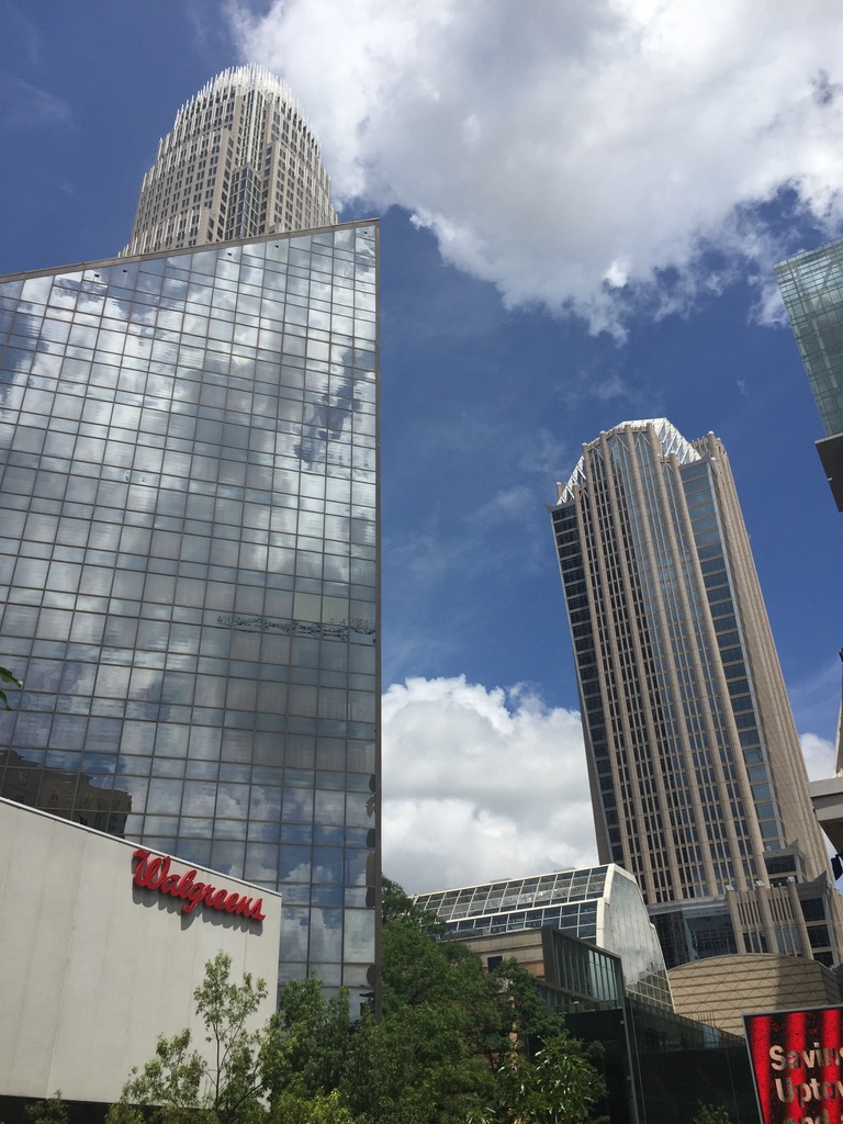 Charlotte’s tallest towers framed above a Trade Street Walgreens.