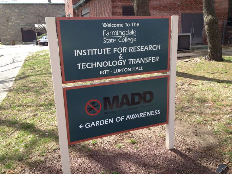 Welcome sign for IRTT at Lupton Hall, with the MADD Garden of Awareness behind.