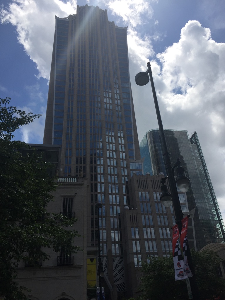 Sunlight crests the stepped roofline of Hearst Tower in uptown Charlotte.