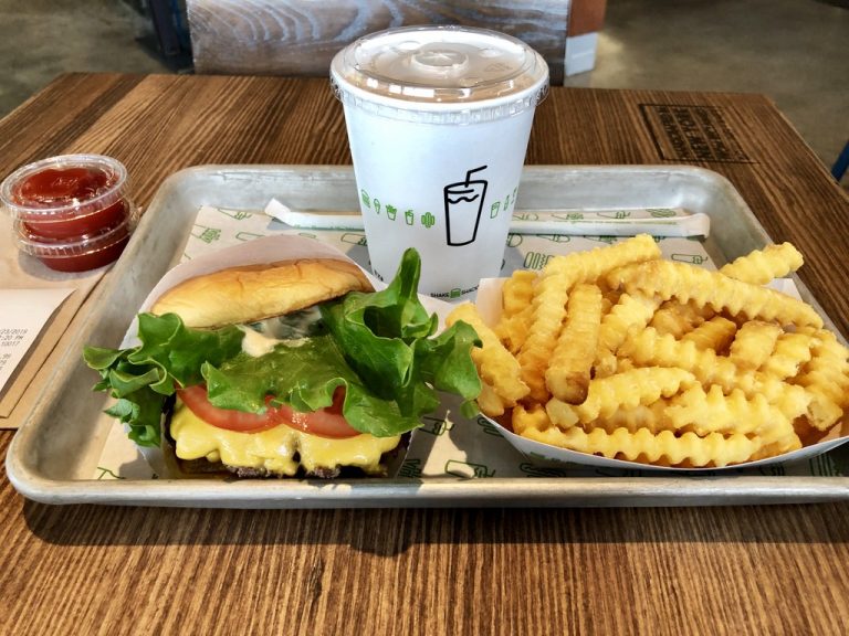 ShackBurger, crinkle fries, and a cup at Shake Shack Stonecrest.