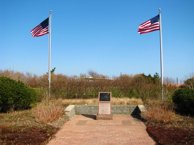 A memorial plaza framed by flagpoles at Jones Beach.