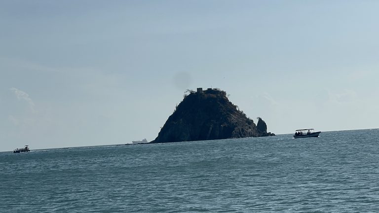 A luxury expedition vessel anchored off El Morro Island