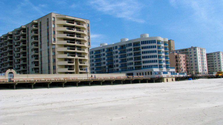 Long Beach condo towers seen from the sand.